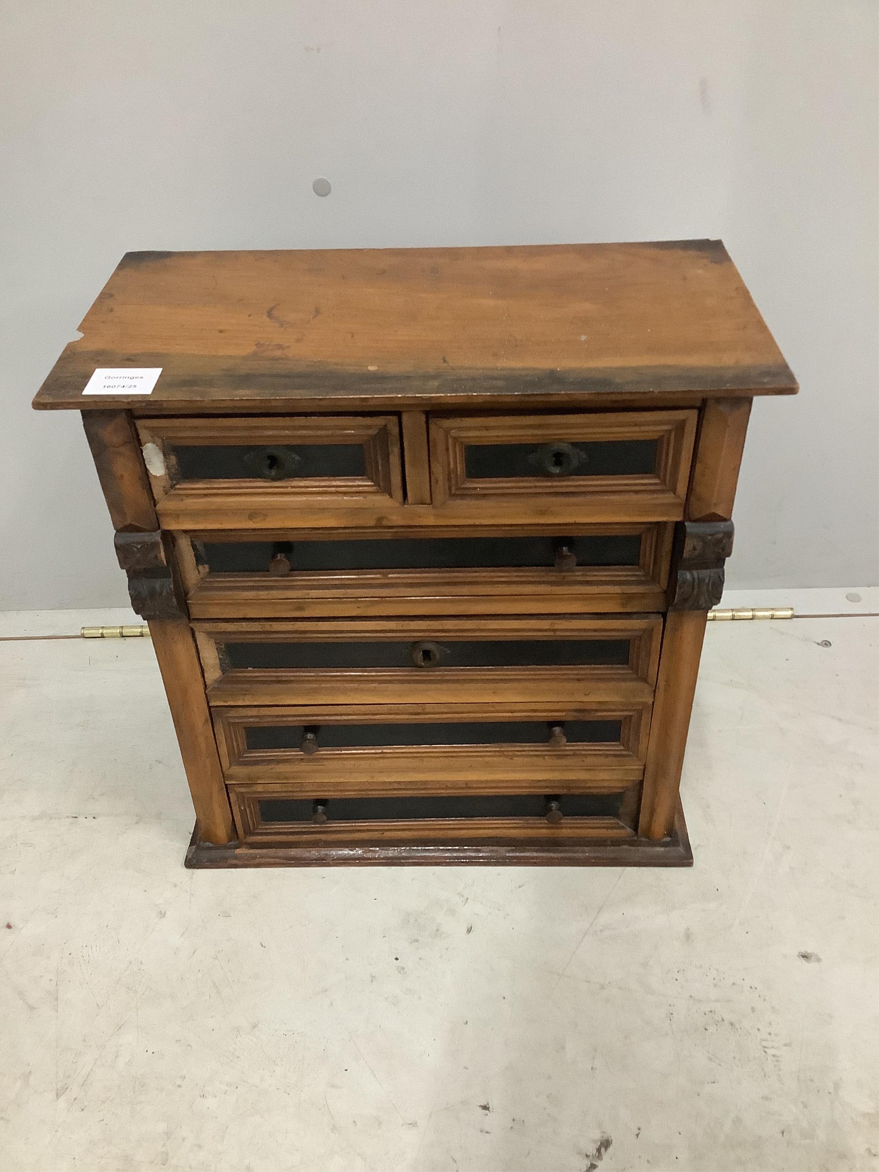 A 19th century Continental miniature chest of six drawers, width 45cm, height 46cm. Condition - a few sections of moulding loose but present, otherwise fair